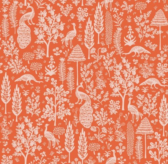 tissu imprimé camont paons rifle paper co bicolore fond orange abricot motif paon et arbres beige clair